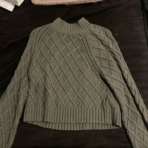 Green knitted sweater